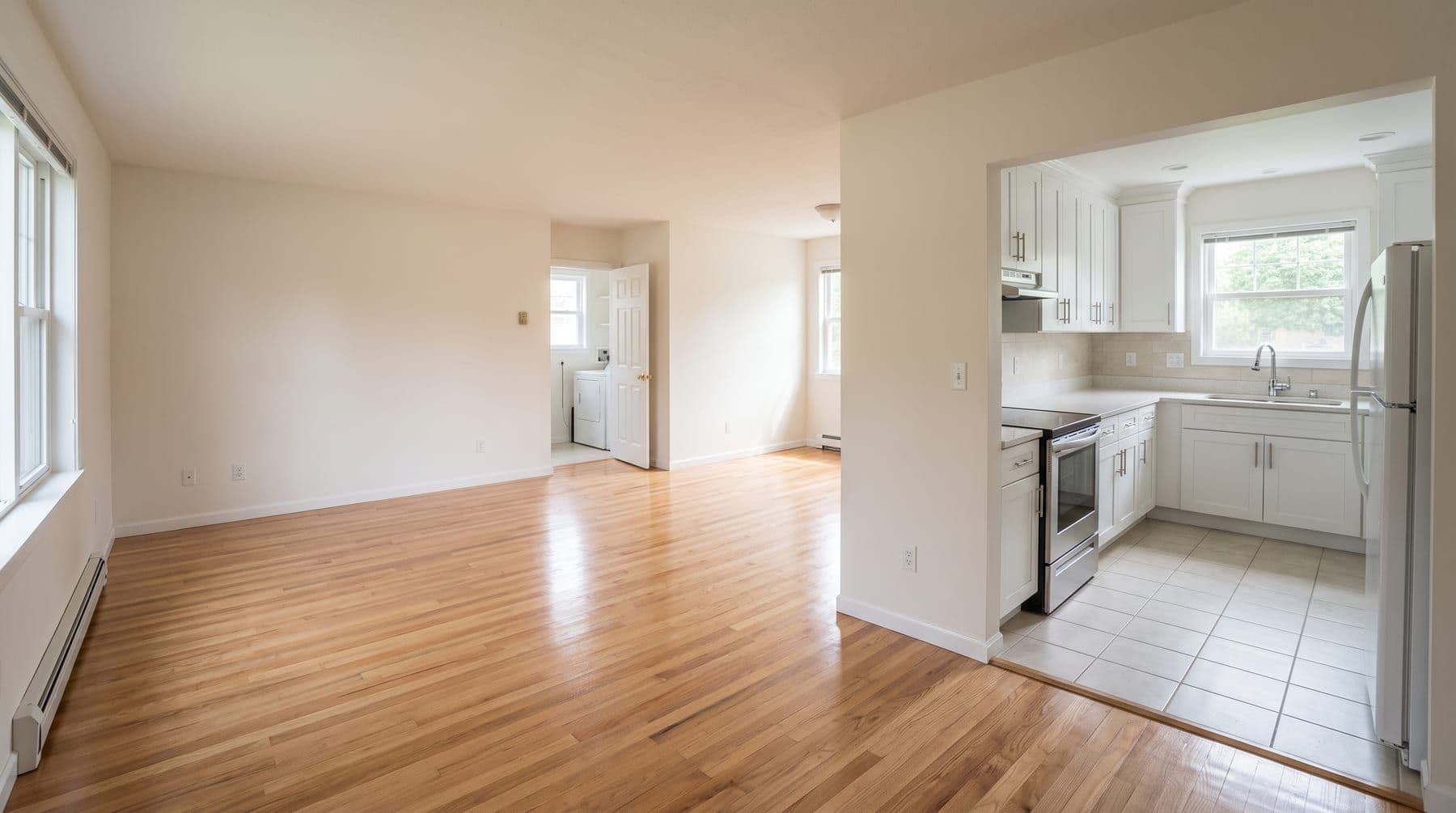 Empty room with polished floors after a thorough move-out clean